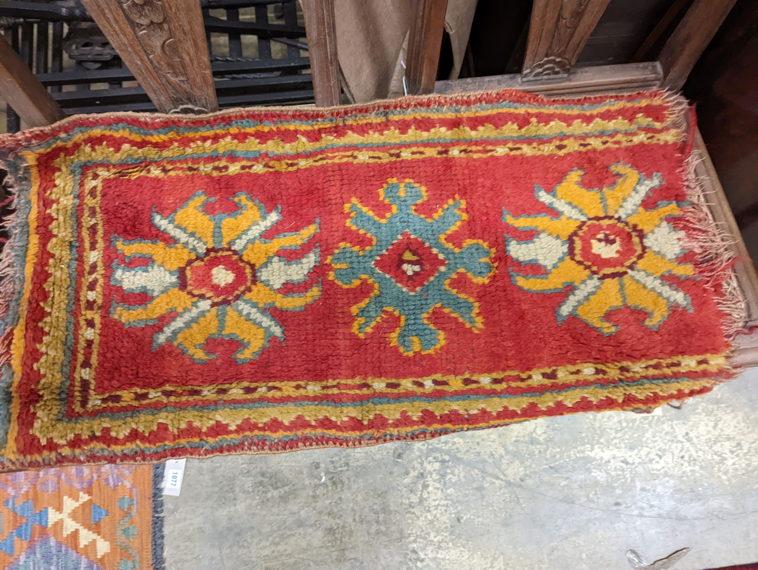 Two antique Oushak Turkish rugs, 77 x 40cm and 72 x 36cm